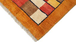 Backside of handmade New Lori rug showing knot structure and weave density