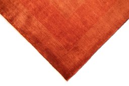 Backside of handmade New Lori rug showing knot structure and weave density
