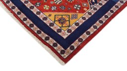 Backside of handmade New Lori rug showing knot structure and weave density