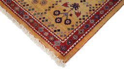 Backside of handmade New Lori rug showing knot structure and weave density