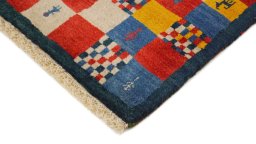Backside of handmade New Lori rug showing knot structure and weave density