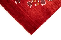 Backside of handmade New Lori rug showing knot structure and weave density