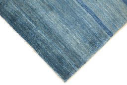 Backside of handmade New Lori rug showing knot structure and weave density