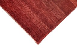 Backside of handmade New Lori rug showing knot structure and weave density