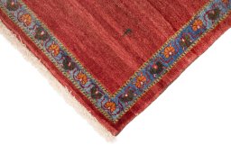 Backside of handmade New Lori rug showing knot structure and weave density