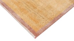 Backside of handmade New Lori rug showing knot structure and weave density