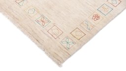 Backside of handmade New Lori rug showing knot structure and weave density
