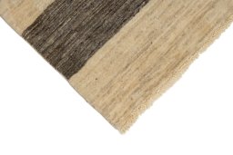 Backside of handmade New Lori rug showing knot structure and weave density