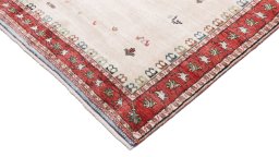 Backside of handmade New Lori rug showing knot structure and weave density