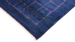 Backside of handmade New Lori rug showing knot structure and weave density
