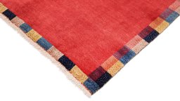 Backside of handmade New Lori rug showing knot structure and weave density