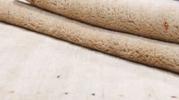 Full view of 1980s Lori rug from Iran / Persia, 236 × 173 cm in Cream tones