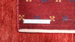 Full view of New Lori rug from Iran / Persia, 239 × 173 cm in Red tones