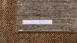 Corner detail of 1980s Lori rug showing border pattern and Wool pile