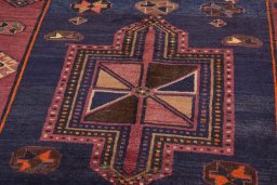 Backside of handmade 2000s Lori rug showing knot structure and weave density