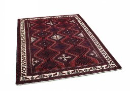 Corner detail of 2000s Lori rug showing border pattern and Wool pile
