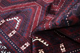 Corner detail of 2000s Lori rug showing border pattern and Wool pile