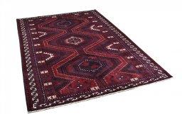 Corner detail of 2000s Lori rug showing border pattern and Wool pile