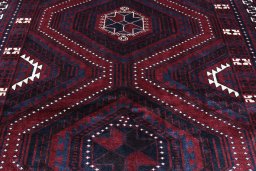 Backside of handmade 2000s Lori rug showing knot structure and weave density