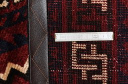 Corner detail of 2000s Lori rug showing border pattern and Wool pile