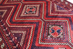 Surface texture of 2000s Lori rug with natural Wool and intricate pattern