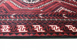 Surface texture of 2000s Lori rug with natural Wool and intricate pattern