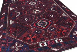 Surface texture of 2000s Lori rug with natural Wool and intricate pattern