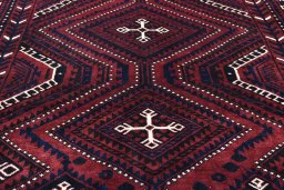 Surface texture of 2000s Lori rug with natural Wool and intricate pattern