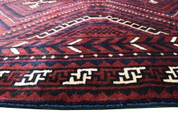 Backside of handmade 2000s Lori rug showing knot structure and weave density