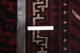 Full view of 2000s Lori rug from Iran / Persia, 297 × 210 cm in Red tones