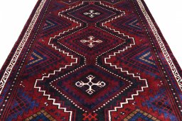 Surface texture of 2000s Lori rug with natural Wool and intricate pattern