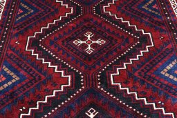 Backside of handmade 2000s Lori rug showing knot structure and weave density