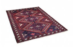 Corner detail of 2000s Lori rug showing border pattern and Wool pile