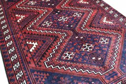 Surface texture of 2000s Lori rug with natural Wool and intricate pattern