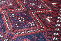 Central medallion detail of 2000s Lori rug from Iran / Persia