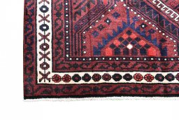 Corner detail of 2000s Lori rug showing border pattern and Wool pile