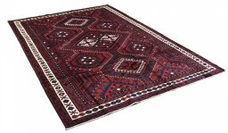 Corner detail of 2000s Lori rug showing border pattern and Wool pile
