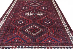 Surface texture of 2000s Lori rug with natural Wool and intricate pattern