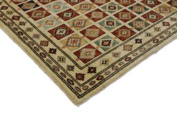 Backside of handmade New Lori rug showing knot structure and weave density