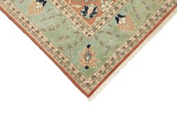 Backside of handmade New Mahal rug showing knot structure and weave density