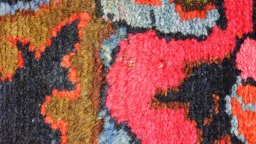 Corner detail of 1920s Malayer rug showing border pattern and Wool pile