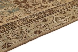 Surface texture of 1920s Malayer rug with natural Wool and intricate pattern
