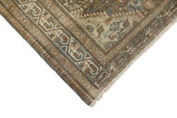 Backside of handmade 1920s Malayer rug showing knot structure and weave density