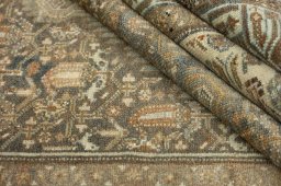 Close-up detail of 1920s Malayer rug from Iran / Persia showing Wool weave