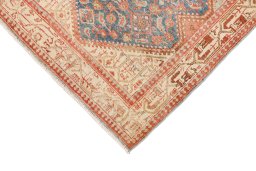 Backside of handmade 1920s Malayer rug showing knot structure and weave density