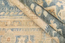 Corner detail of 1920s Malayer rug showing border pattern and Wool pile