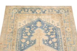 Surface texture of 1920s Malayer rug with natural Wool and intricate pattern