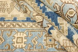 Corner detail of 1920s Malayer rug showing border pattern and Wool pile