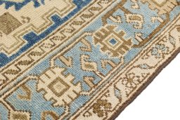 Close-up detail of 1920s Malayer rug from Iran / Persia showing Wool weave