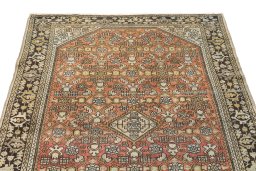 Surface texture of 1920s Malayer rug with natural Wool and intricate pattern